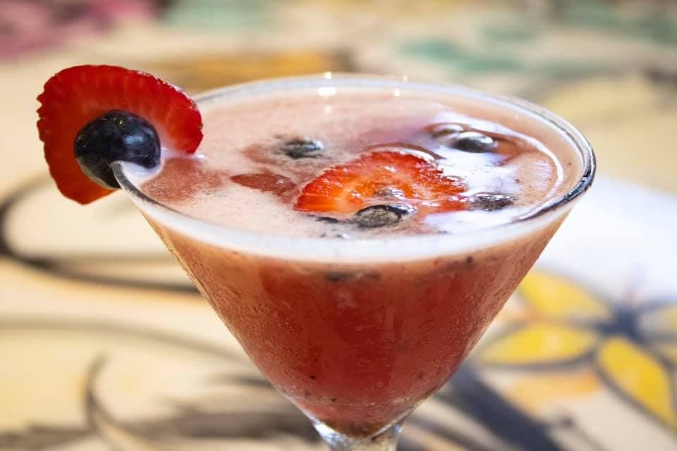 A pink margarita on the rocks.